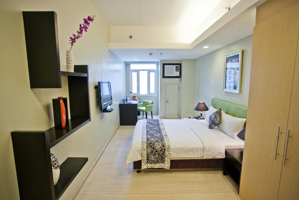 The Exchange Regency Residence Hotel Managed By Hii Pasig City Zewnętrze zdjęcie