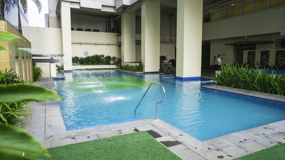 The Exchange Regency Residence Hotel Managed By Hii Pasig City Zewnętrze zdjęcie