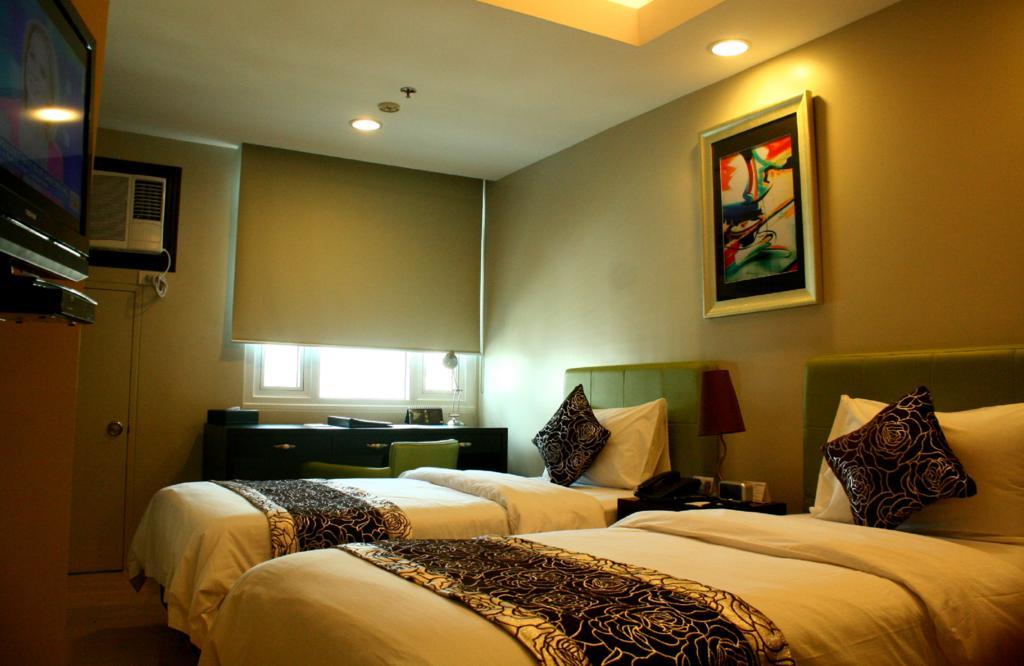 The Exchange Regency Residence Hotel Managed By Hii Pasig City Zewnętrze zdjęcie