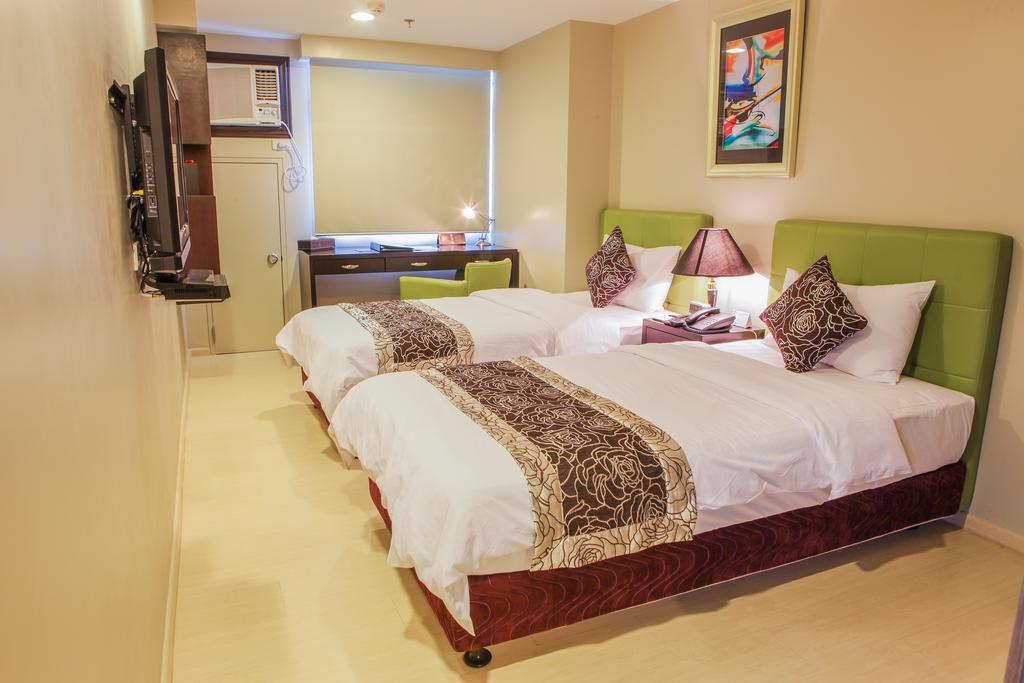 The Exchange Regency Residence Hotel Managed By Hii Pasig City Zewnętrze zdjęcie